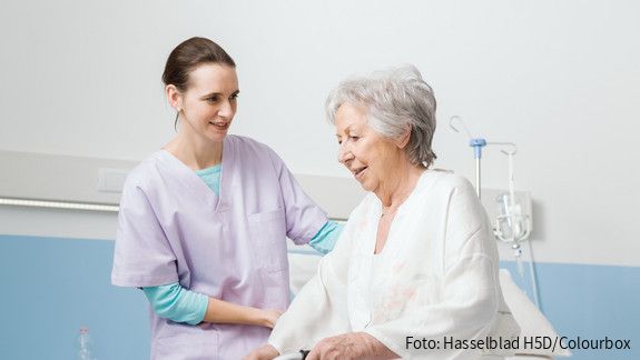 People, Healthcare, Woman, Senior, Nurse, Smiling, Happy, Caregiver, Hospital, Patient, Medical, Medicine, Walker, Helping, Holding, Supporting, Assisting, Medical service, Retirement home, Physiotherapist, Illness, Hospitalized, Clinic, Senior care, Senior citizen, Elderly, Old, Hospital bed, Assistance, Care, Patient care, Health, Elder, Grandmother, Retirement, Nursing, Pensioner, Geriatrics, Bedroom, Treatment, Ward, Clean, Rehabilitation