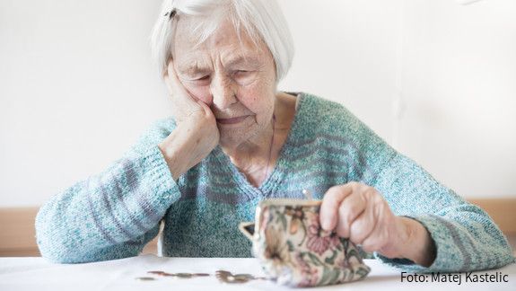 Concerned elderly woman sitting at the table counting money in her wallet. senior, pensioner, elderly, woman, wallet, poverty, retirement, old, empty, coins, background, money, miserable, broke, lonely, alone, poor, purse, aged, problem, concept, female, finance, financial, pension, adult, care, cash, donation, emotion, hand, leather, person, sad, sitting, table, debt, holding, age, bankrupt, business, buy, closeup, counting, bill, portrait, survival, caucasian, 90s, hopeless